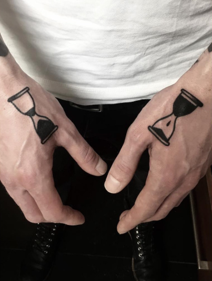Hourglass hand tattoos by Matty Darienzo