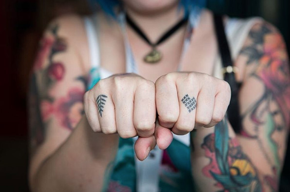Cross-stitch and leaf knuckle tattoos via Knuckles 365