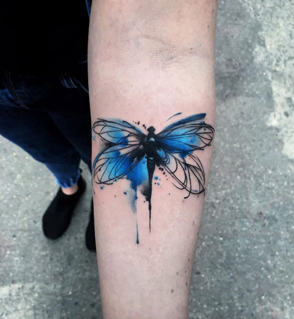 Blue watercolor dragonfly on forearm by Aleksandra Kozubska