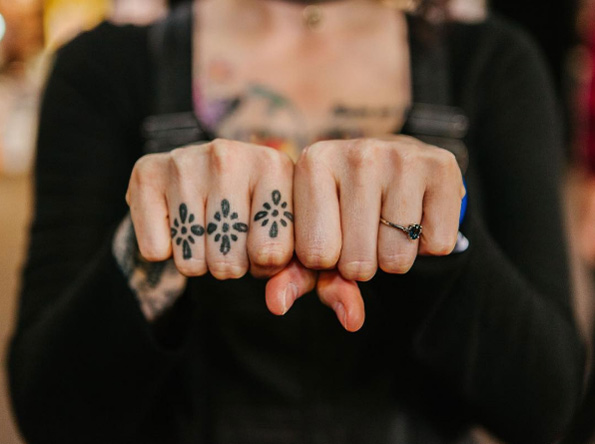Three ring knuckle tattoos via Knuckles 365