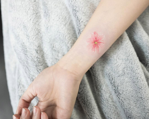 Elegant floral wrist tattoo by Hongdam