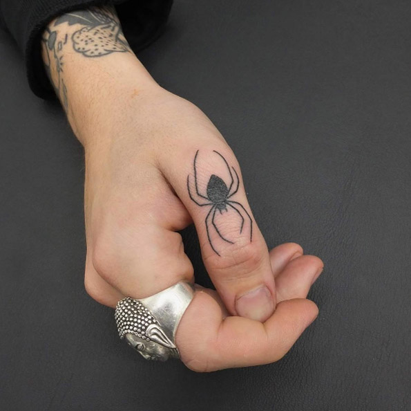 Spider tat on finger by Indy
