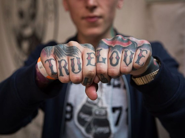'True love' knuckle tattoos via Knuckles 365