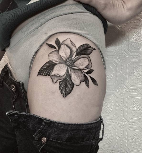 Magnolia tattoo by Justin Oliver