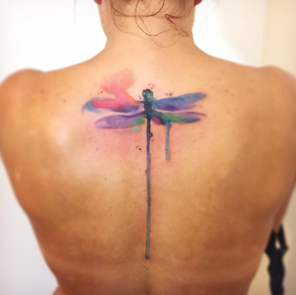 Dripping watercolor dragonfly tattoo by Bora Tattoo