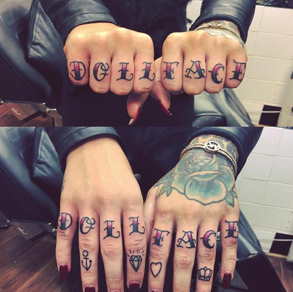 'Doll face' knuckle tattoos by Steffi Cocco