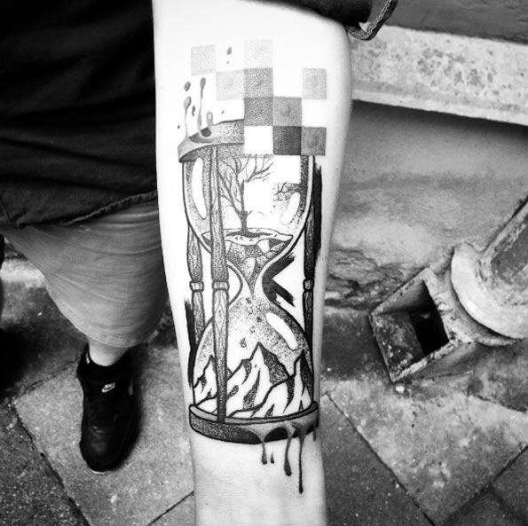 pixellated hourglass tattoo by Martynas Snioka