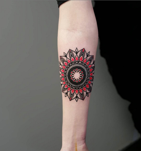 Mandala flower with red ink by Matteo Nangeroni