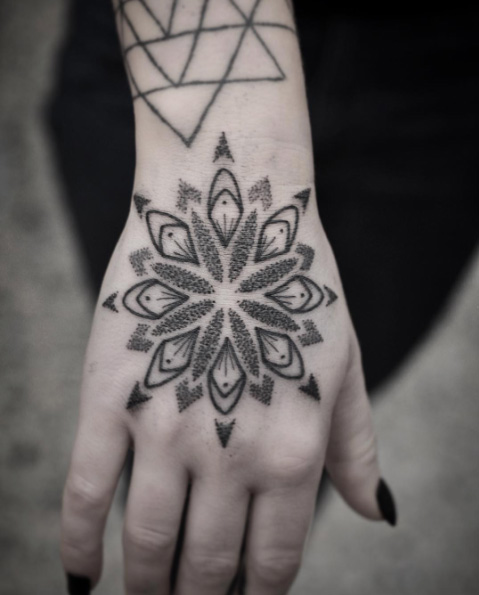 Dotwork mandala flower tattoo on hand by Chris Jones