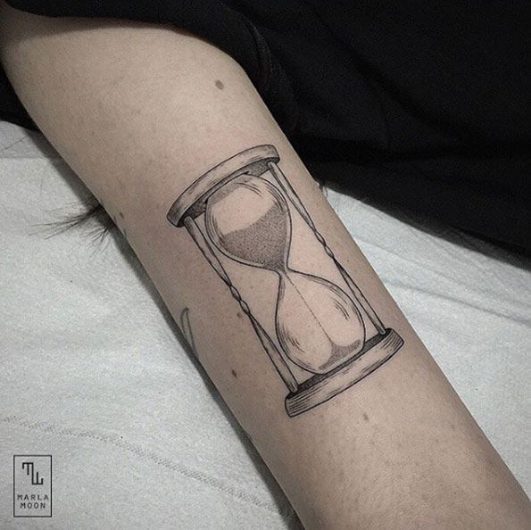 Elegant dotwork hourglass tattoo by Marla Moon