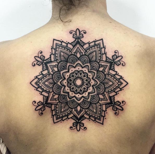 Ornamental mandala flower on back by Melow Perez