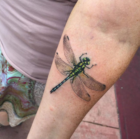 Hyperrealistic dragonfly tattoo by Miami Tattoo Co