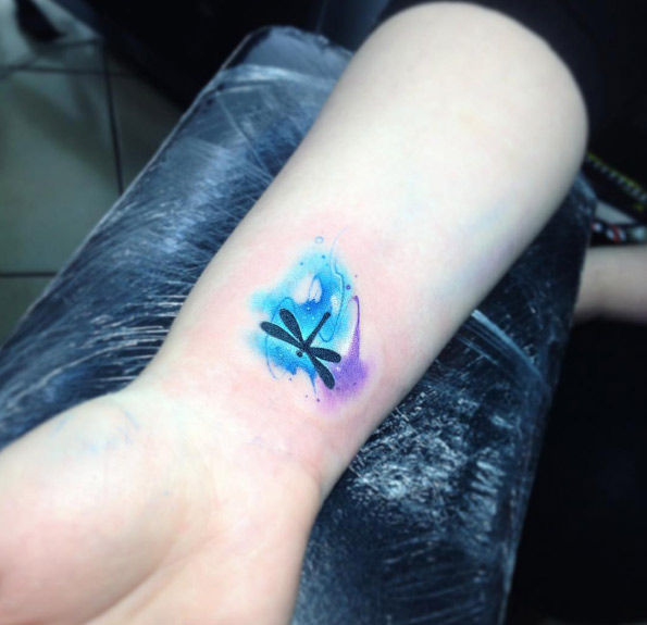 Adorable watercolor wrist tattoo by Adrian Bascur