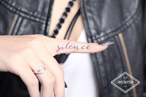 'Silence' finger tat by Tapz