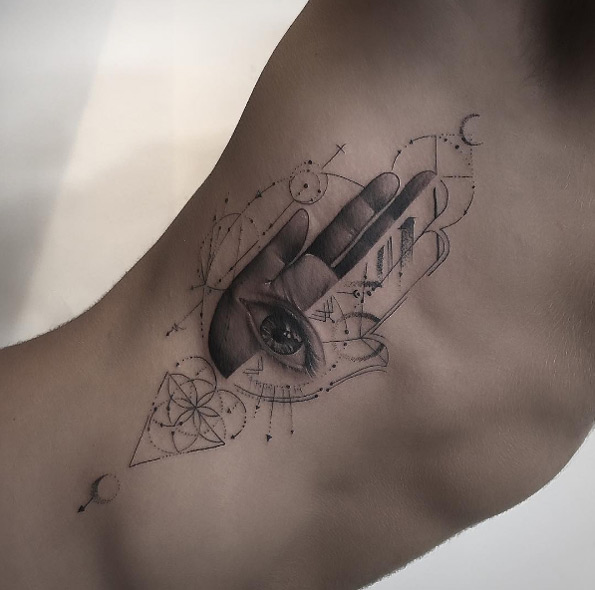 Hamsa hand tattoo by Jean Alvarez