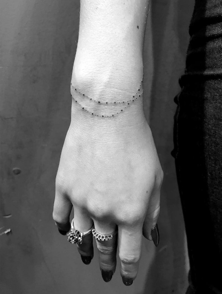 Bracelet tattoo by Daniel Winter