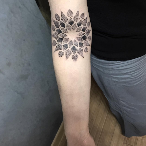 Dotwork mandala tattoo by Caglar