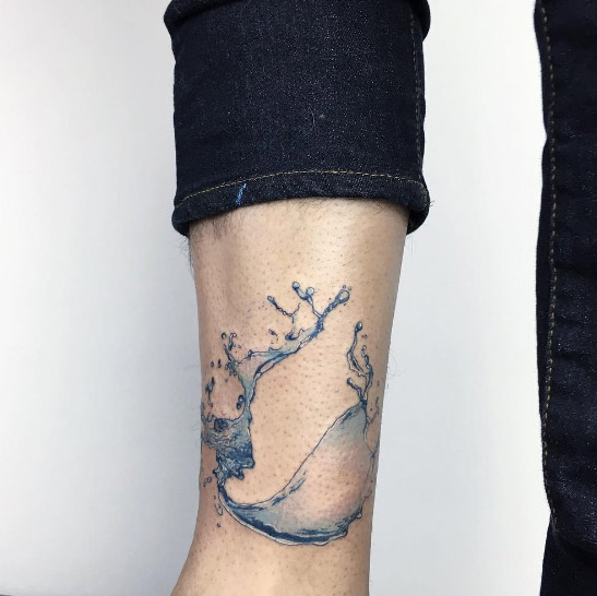 Realistic wave tattoo by Baris Yesilbas