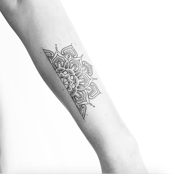 Cut-off mandala flower tattoo by Carin Silver