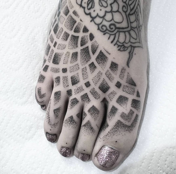 Mandala pattern on foot