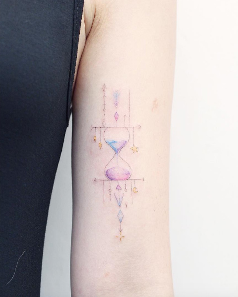 Cute hourglass tattoo by Mini Lau