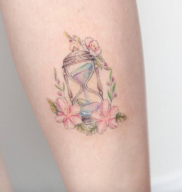 Feminine hourglass tattoo by Hello Tattoo