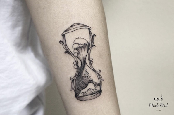 Hourglass wave tattoo by Luiza Oliveira