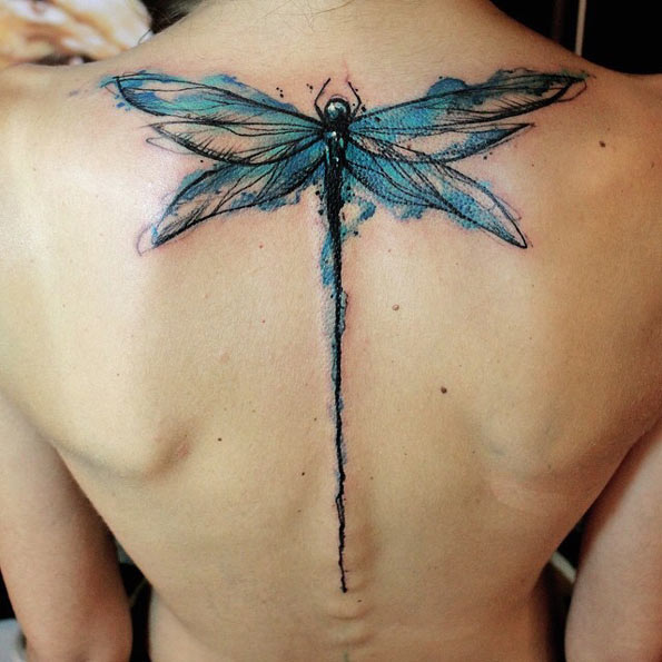 Dragonfly tattoo on back
