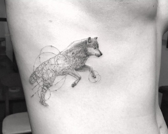 Detailed single needle wolf tattoo by Doctor Woo
