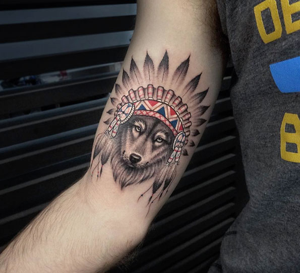 Wolf with headdress tattoo by Elisabeth Markov