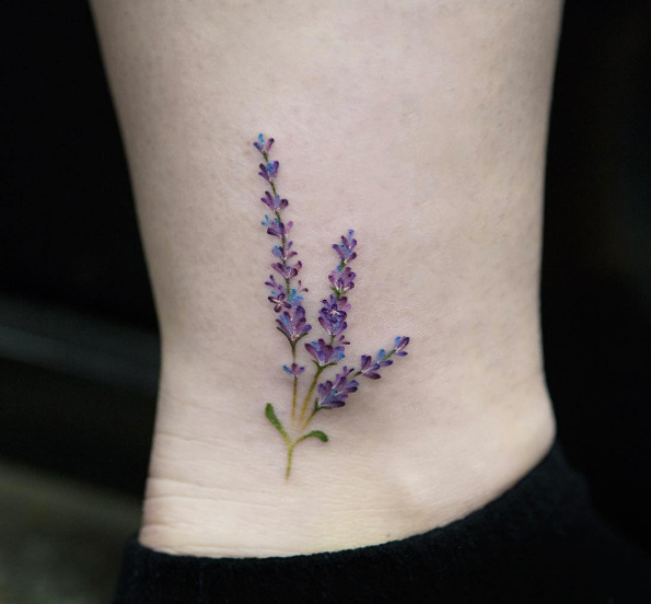 Lavender flower on ankle by Georgia Grey