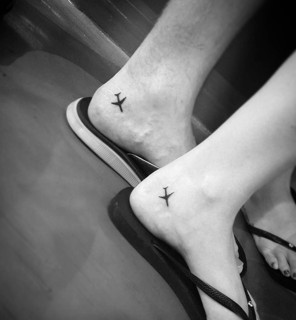 Matching plane tattoos by Lilo