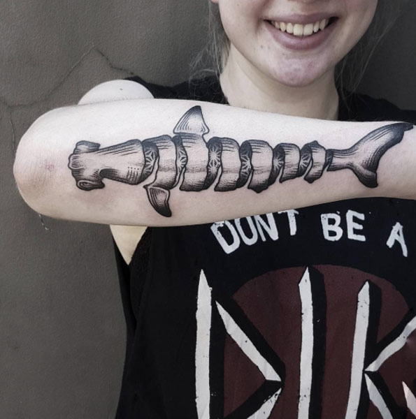 Spiraling hammerhead tattoo by Ben Doukakis