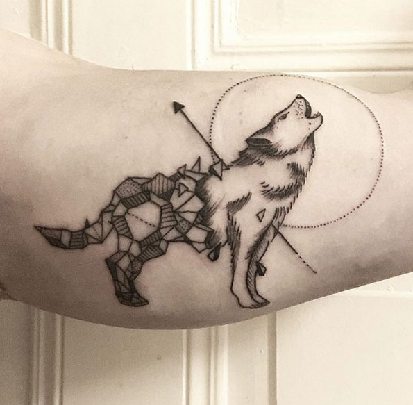 Half geometric wolf tattoo by Cate