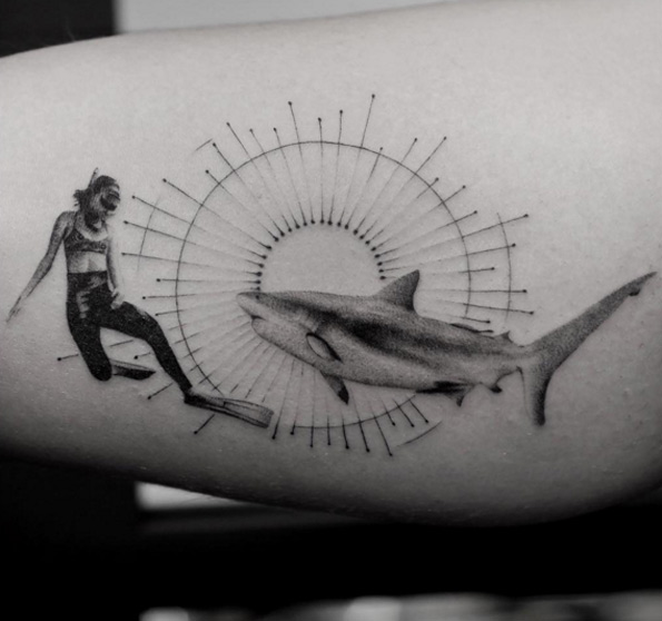 Snorkeler and shark tattoo by Balazs Bercsenyi