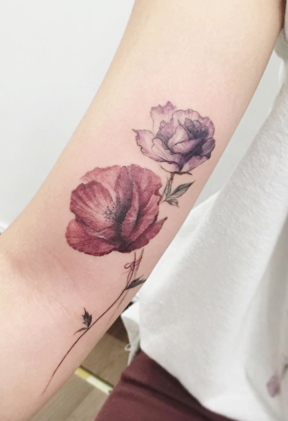 Poppy and rose tattoo by Tattooist Flower