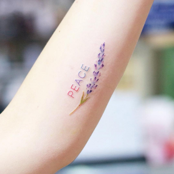 Lavender PEACE tattoo by Justice Ink