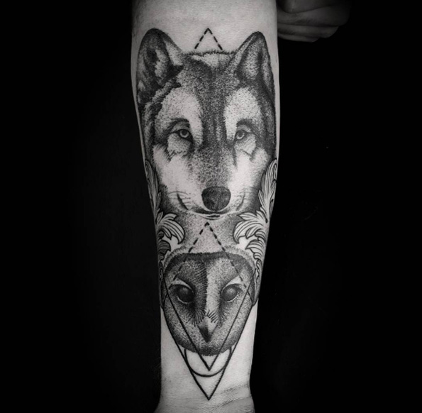 Wolf and owl tattoo by Eric Stricker
