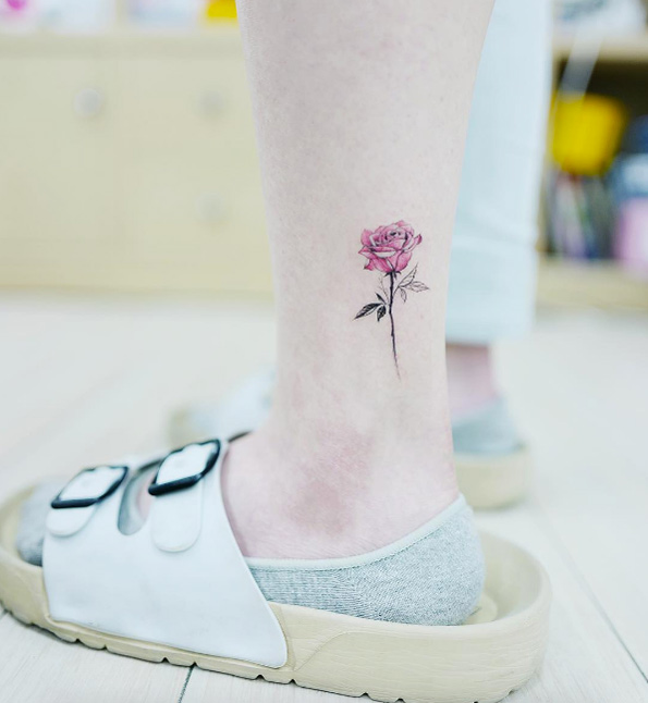 Small rose tattoo on ankle by Banul