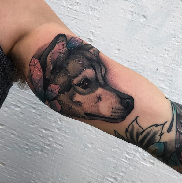Wolf tattoo with crystals by Chris Stockings