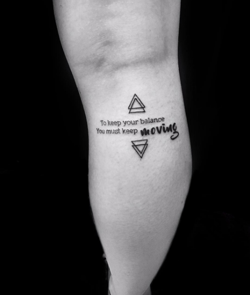 'To keep your balance you must keep moving' by Channing Tattoo