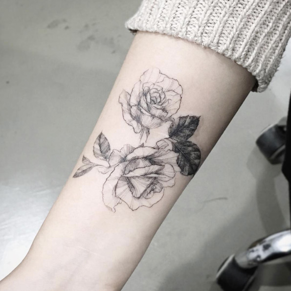 Roses on forearm by Tattooist Flower