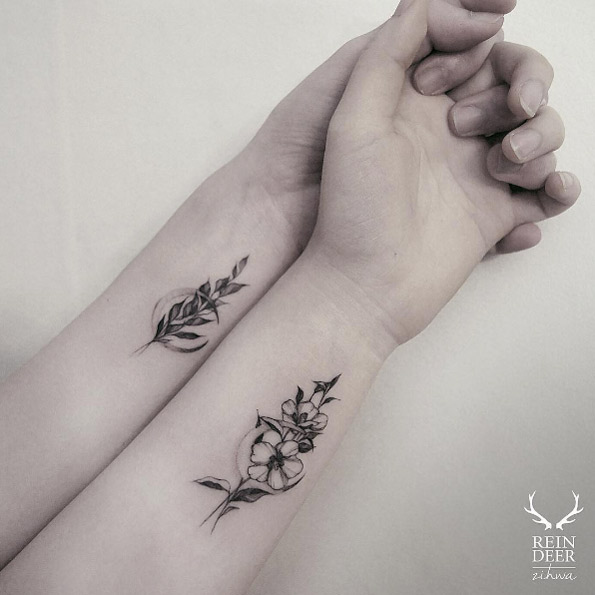 Matching botanical tattoos by Zihwa