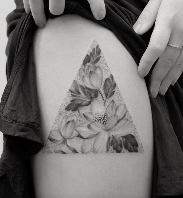 Triangular lotus flower tattoo by Tritoan Ly