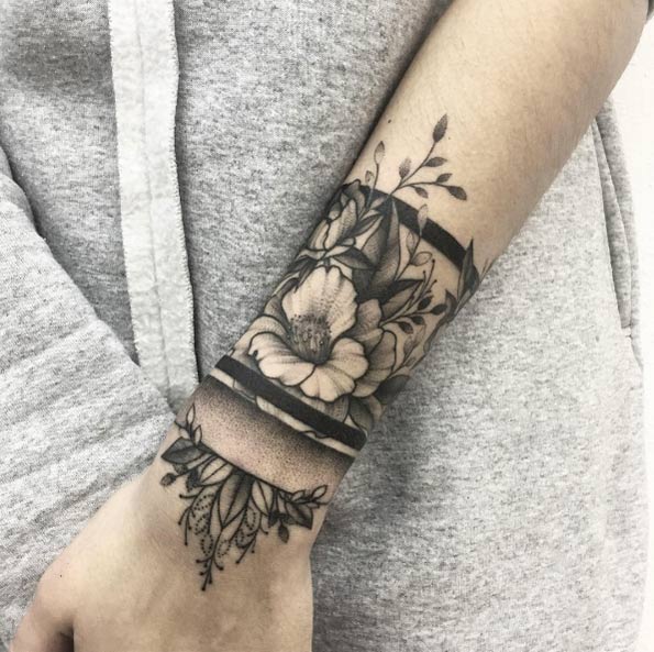 Floral cuff tattoo by Vlada Shevchenko