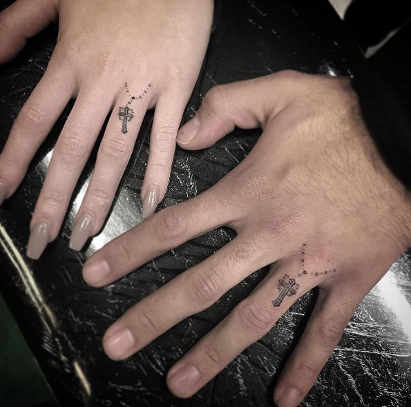 His and her knuckle tattoos by Isaiah Negrete