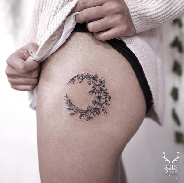 Floral moon on thigh by Zihwa