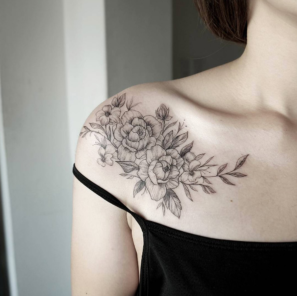 Elegant blackwork floral shoulder piece by Chaehwa