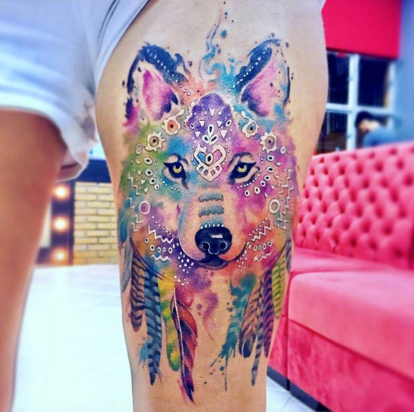 Vivid watercolor wolf tattoo by Erick Silva