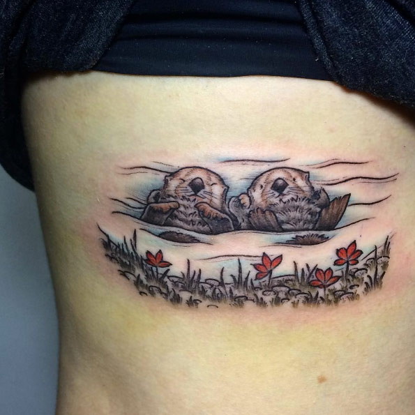 Sea otter couple by Fin Tattoos